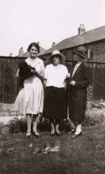 Framed Print : Three women with a dog and tortoises in a garden Framed Print : Three women with a dog and tortoises in a garden