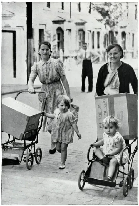 Framed Print : Two women with infants and new baby gas masks, Sept 1939 Framed Print : Two women with infants and new baby gas masks, Sept 1939
