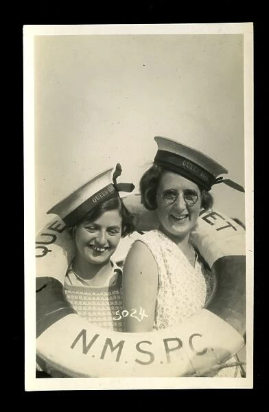 Two women with lifebelt and sailors caps