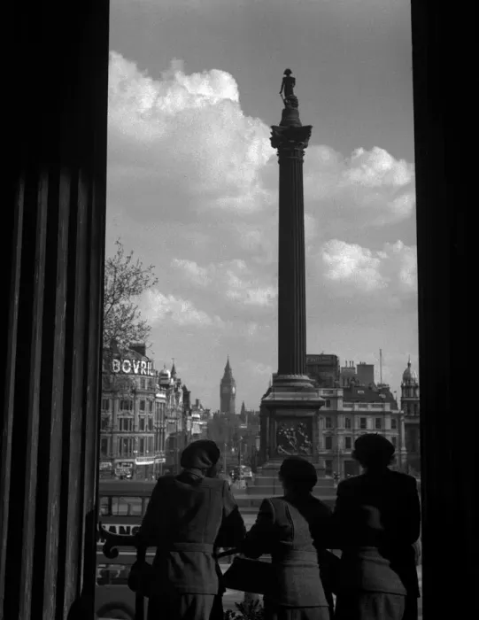 Framed Print : Women look out on Trafalgar Square, London Framed Print : Women look out on Trafalgar Square, London