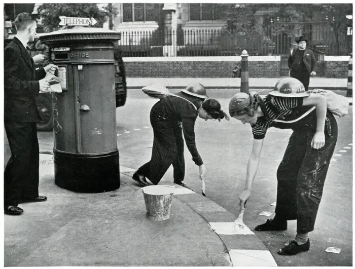 Framed Print : Women painting kerbside for blackouts, September 1939 Framed Print : Women painting kerbside for blackouts, September 1939