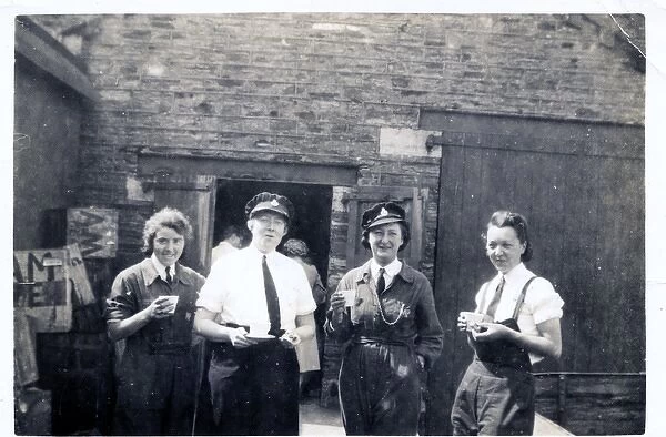 Four women police officers having a tea break, WW2