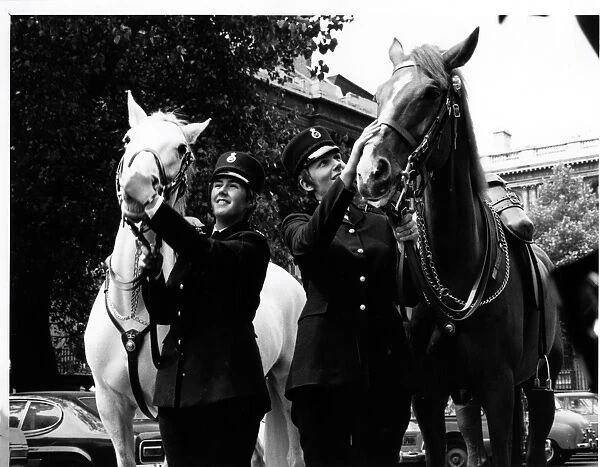 Two women police officers with horses, London