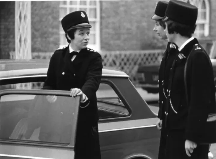 Framed Print : Three women police officers standing by a car, London Framed Print : Three women police officers standing by a car, London