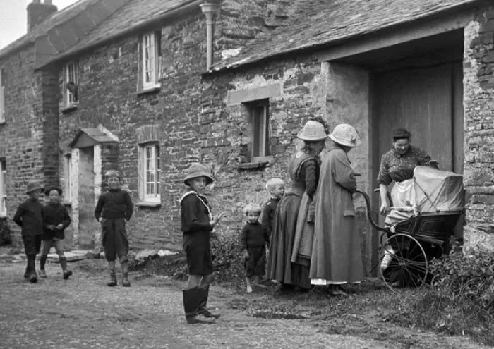 Framed Print : Women and pram in village street Framed Print : Women and pram in village street