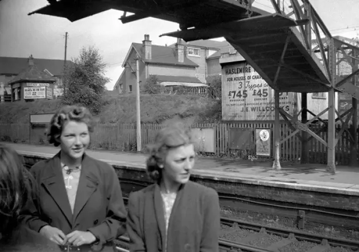 Framed Print : Two women at a railway station, South London Framed Print : Two women at a railway station, South London