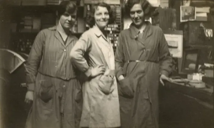 Framed Print : Three women in a small business - wearing overalls