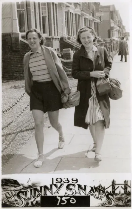 Framed Print : Two women walking down a London Street - Summer Framed Print : Two women walking down a London Street - Summer