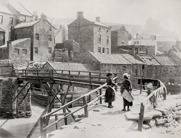 Wooden bridge over a stream at Staithes, Yorkshire