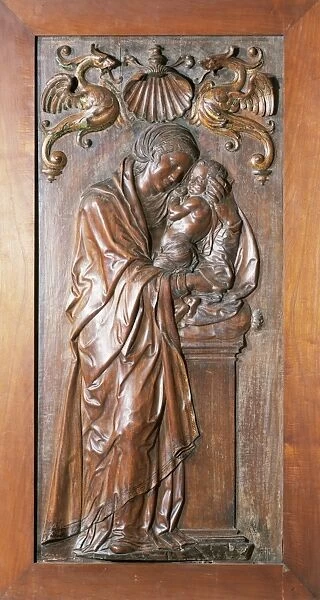 Wooden relief of Virgin with Infant by Diego Siloe. 1544