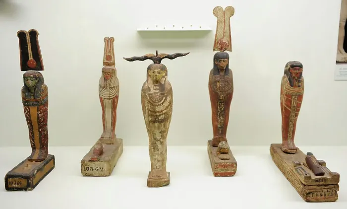 Framed Print : Wooden statuettes depicting Gods Ptah, Osiris and Seker bird Framed Print : Wooden statuettes depicting Gods Ptah, Osiris and Seker bird