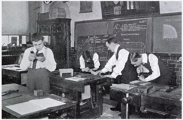 Woodwork classroom for boys who continued their education at Acland County Council School, Kentish Town, London. Date: 1906