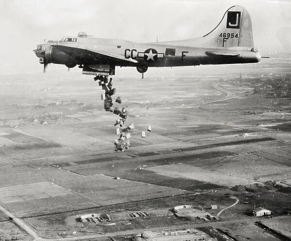 World War II B-17 Flying fortress makes food drop