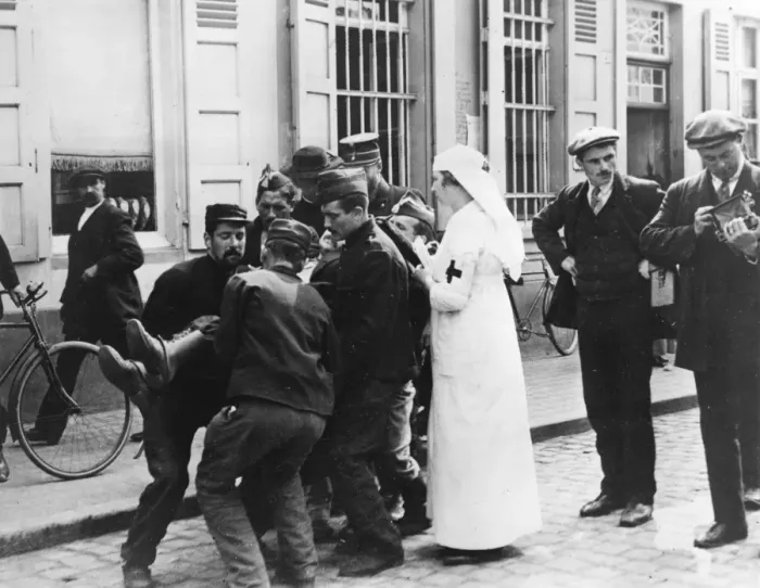 Framed Print : Wounded man in street, Malines, Belgium, WW1