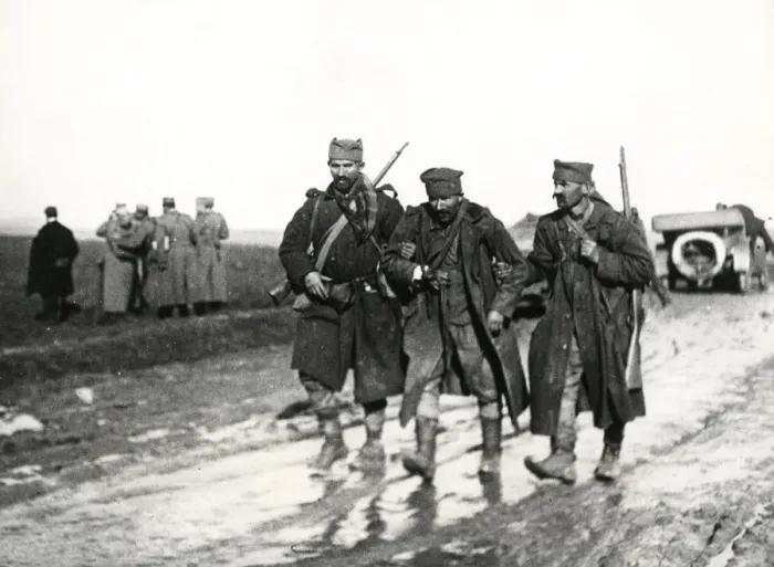 Framed Print : Wounded soldier on muddy road, Macedonian Front, WW1 Framed Print : Wounded soldier on muddy road, Macedonian Front, WW1