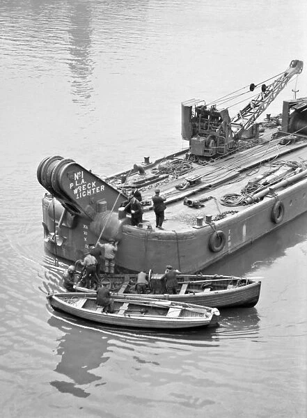 Wreck lighter and two boats, London