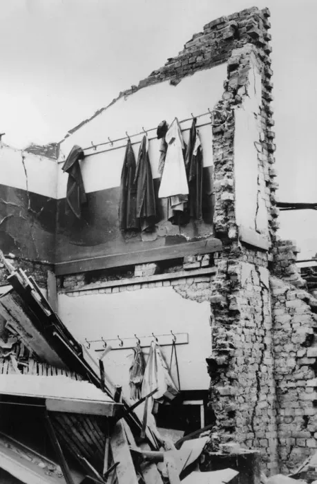 Framed Print : WW2 - Bomb Damage in London - Coats and Hats left on hooks Framed Print : WW2 - Bomb Damage in London - Coats and Hats left on hooks