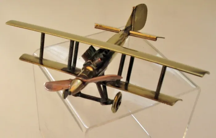 Framed Print : WWI biplane bullet fuselage with copper propeller Framed Print : WWI biplane bullet fuselage with copper propeller