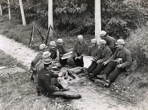 WWI: French soldiers resting by roadside