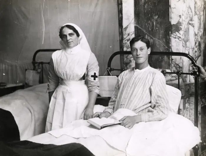 Framed Print : WWI: soldier in military hospital, with nurse Framed Print : WWI: soldier in military hospital, with nurse