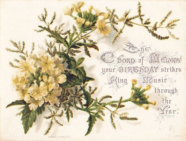 Yellow flowers made of silk on a birthday card