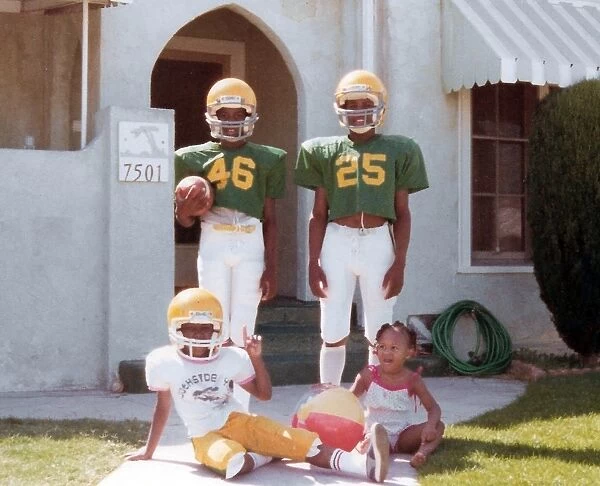Young black American children in football outfits