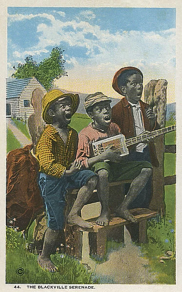 Three young black boys singing
