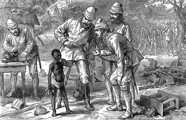 A young boy with British officers in Kumasi, 1874