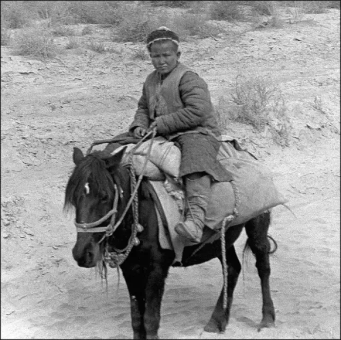 Framed Print : Young boy on a donkey, Kashgar, western China Framed Print : Young boy on a donkey, Kashgar, western China