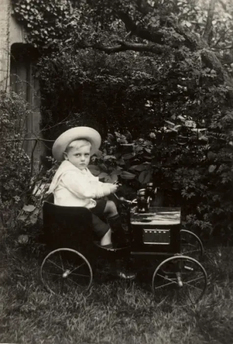Framed Print : Young boy in an elegant toy car Framed Print : Young boy in an elegant toy car