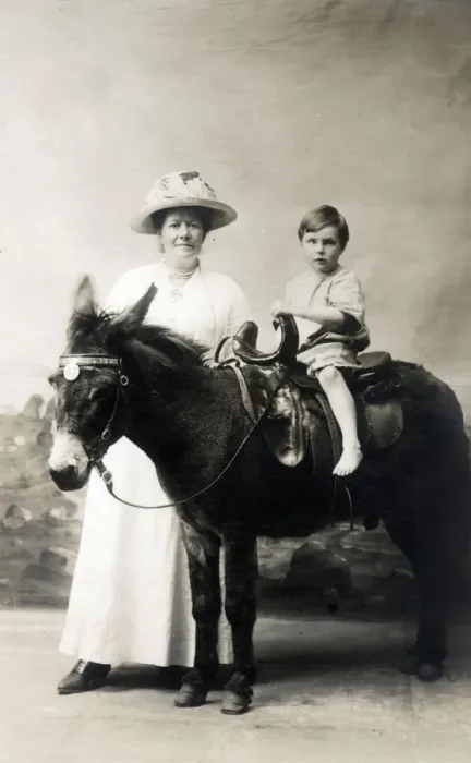 Framed Print : Young Boy and his Mother - Studio photo on a donkey Framed Print : Young Boy and his Mother - Studio photo on a donkey