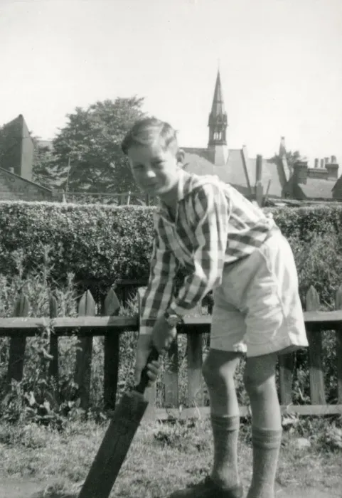 Framed Print : A Young boy playing cricket in a suburban garden - he awaits for a delivery to arrive Framed Print : A Young boy playing cricket in a suburban garden - he awaits for a delivery to arrive