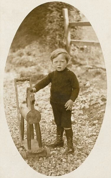 Young boy and his toy horse