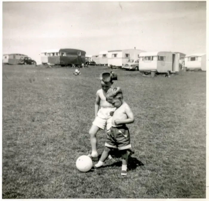Framed Print : Young brothers playing with ball at a holiday camp Framed Print : Young brothers playing with ball at a holiday camp