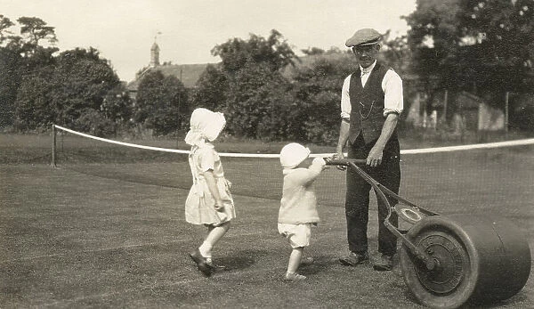 Two young children with the Gardener at Oddington House