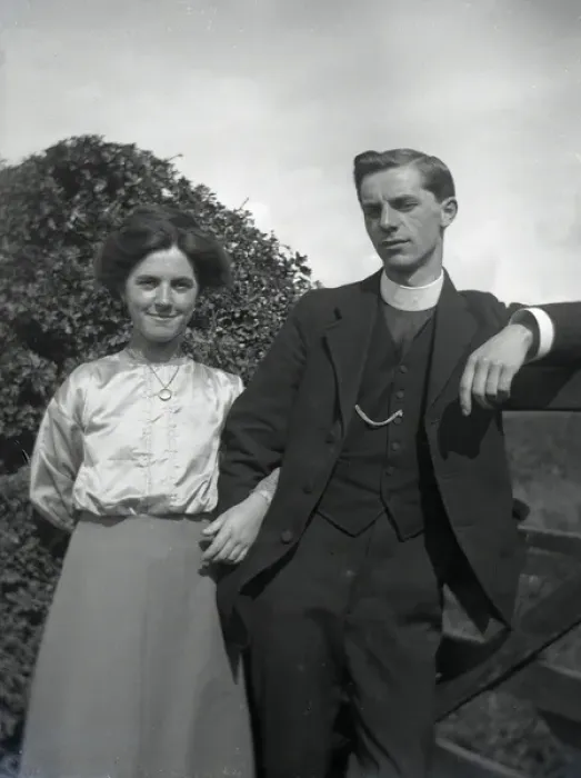 Framed Print : Young clergyman with young woman Framed Print : Young clergyman with young woman