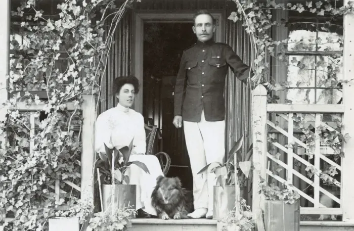 Framed Print : Young couple and a dog on a garden porch Framed Print : Young couple and a dog on a garden porch