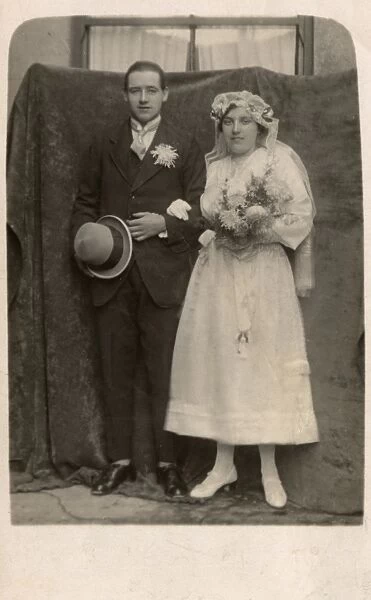 Young couple in wedding costume