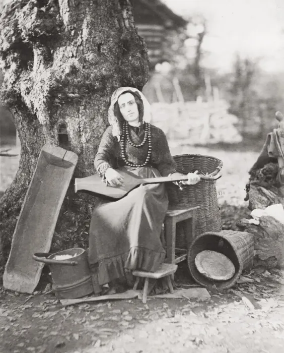 Framed Print : Young female musician, Russia, Caucasus Framed Print : Young female musician, Russia, Caucasus