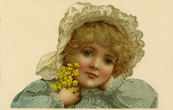 Young girl with buttercups