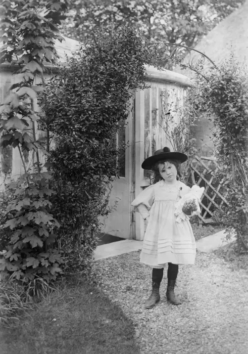 Framed Print : Young Girl in Garden Framed Print : Young Girl in Garden