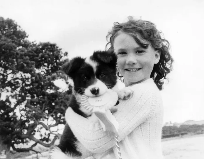Framed Print : Young girl with Puppy Framed Print : Young girl with Puppy
