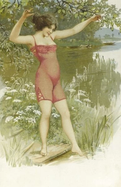 Young girl in underwear poses by the river