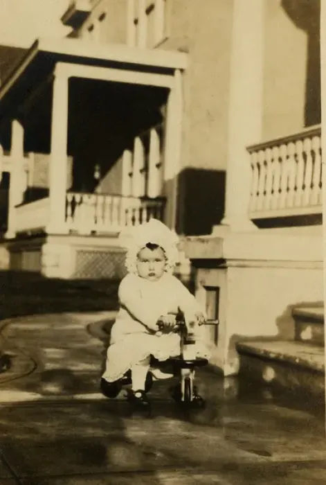 Framed Print : Young girl on a wooden trike Framed Print : Young girl on a wooden trike