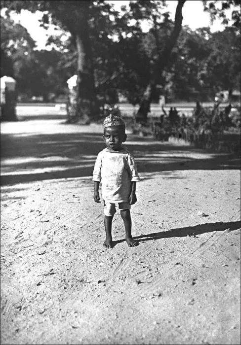 Framed Print : A young Indian toddler on a dusty road Framed Print : A young Indian toddler on a dusty road