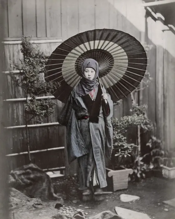 Framed Print : Young Japanese woman in winter costume with umbrella Framed Print : Young Japanese woman in winter costume with umbrella