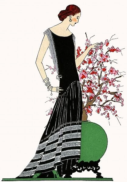 Young lady in black evening dress by Jeanne Lanvin