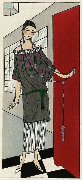 Young lady in grey and white outfit by Paul Poiret
