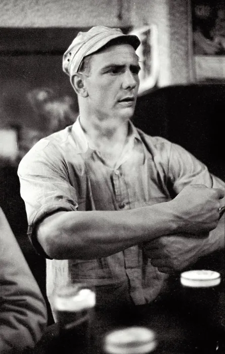 Framed Print : Young man in bar with cap listening to small band playing in daylight at local bar at Cafe In de Ton de Koninck in Katten Straat Antwerp Date: circa 1951 Framed Print : Young man in bar with cap listening to small band playing in daylight at local bar at Cafe In de Ton de Koninck in Katten Straat Antwerp Date: circa 1951