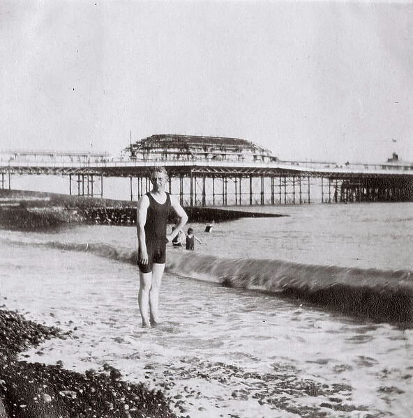 Young man on the beach, Brighton, Sussex